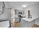 Updated kitchen boasts modern appliances, white countertops, and gray cabinets at 1335 Seneca, Cumming, GA 30041
