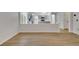 View from Living Room into the updated kitchen with modern stainless appliances at 1335 Seneca, Cumming, GA 30041