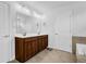 Bathroom with double sink vanity, large mirror, and tile flooring for a spa-like experience at 307 Ernest Ave, Peachtree City, GA 30269
