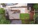 Aerial shot shows a backyard oasis, a shed, a patio and a lush green lawn at 3412 Orchard St, Atlanta, GA 30354