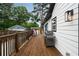 Spacious wooden back deck with stainless grill, perfect for entertaining outdoors at 3412 Orchard St, Atlanta, GA 30354