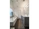 Bright, tiled bathroom featuring a soaking tub, a glass shower, and modern fixtures at 3412 Orchard St, Atlanta, GA 30354