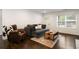 Comfortable living room showcasing stylish furnishings, hardwood floors, and natural light at 3412 Orchard St, Atlanta, GA 30354