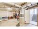 Spacious unfinished basement featuring concrete floors and visible ductwork at 407 Yellowstone Dr, Powder Springs, GA 30127
