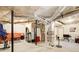 Unfinished basement featuring concrete floor, exposed ceiling, and visible utilities at 407 Yellowstone Dr, Powder Springs, GA 30127