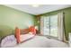 Inviting bedroom with a large window, soft carpet, and delightful decor at 407 Yellowstone Dr, Powder Springs, GA 30127