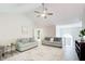 Bright and airy living room featuring neutral walls and lots of natural light at 407 Yellowstone Dr, Powder Springs, GA 30127