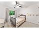 Bright bedroom with large window and decorative touches at 2435 Roxburgh Dr, Roswell, GA 30076