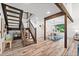 Open foyer showcasing stairs to upper level and dining room with natural light at 2435 Roxburgh Dr, Roswell, GA 30076