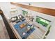 Open-concept living area with vaulted ceilings, modern decor, and backyard views at 2435 Roxburgh Dr, Roswell, GA 30076