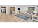 Spacious living room featuring a wet bar and wine fridge at 2435 Roxburgh Dr, Roswell, GA 30076