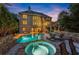 Gorgeous home with an in-ground pool, patio, spa, and beautifully landscaped backyard at 979 Pathview Ct, Dacula, GA 30019