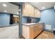 Basement wet bar area featuring modern cabinetry and sink with countertop at 979 Pathview Ct, Dacula, GA 30019