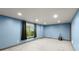 Finished basement bedroom with a window and a soft neutral carpet at 979 Pathview Ct, Dacula, GA 30019