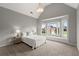 Cozy bedroom with a vaulted ceiling, large bay window, and window seating at 979 Pathview Ct, Dacula, GA 30019
