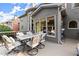 Outdoor deck area with dining set, overlooking a lush green backyard and home exterior at 979 Pathview Ct, Dacula, GA 30019
