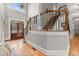 Bright foyer with hardwood floors, staircase, and double front door at 979 Pathview Ct, Dacula, GA 30019