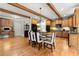 Warm and inviting kitchen with custom cabinets, stainless steel appliances, granite countertops and hardwood floors at 979 Pathview Ct, Dacula, GA 30019