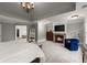 Main bedroom with a fireplace, seating area, and ensuite bathroom access at 979 Pathview Ct, Dacula, GA 30019