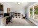 Well-lit home office space with large window and view to outside at 979 Pathview Ct, Dacula, GA 30019