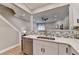 Modern kitchen featuring stainless steel appliances and a subway tile backsplash at 1203 Penhurst Way, Lawrenceville, GA 30043