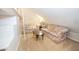 Cozy attic featuring plush loveseats, perfect for a quiet retreat at 155 Redspire Ln, Fayetteville, GA 30215