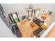 Bright living room boasts fireplace, hardwood floors, and an open floor plan at 155 Redspire Ln, Fayetteville, GA 30215