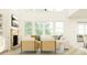 Bright living room with high ceilings, large windows, and modern furnishings at 252 Deer Valley Run, Canton, GA 30115