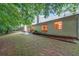 Spacious backyard with patio and mature trees at 3318 Freedom Lndg, Kennesaw, GA 30144