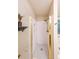 Modern walk-in shower showcasing elegant gold trim and clean white subway tile, with penny tile flooring at 3318 Freedom Lndg, Kennesaw, GA 30144
