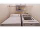 Laundry room features modern white washer and dryer at 3318 Freedom Lndg, Kennesaw, GA 30144
