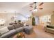Spacious open-concept living room with vaulted ceiling, flowing into the dining area and kitchen at 3318 Freedom Lndg, Kennesaw, GA 30144