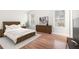 This main bedroom features two windows and a view of the TV at 3448 Great Meadows Ct, Lithonia, GA 30038