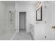 Bathroom featuring a glass shower, vanity, and marble floors at 709 Dodd Ln # 165, Buford, GA 30518