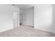 A carpeted bedroom with white walls at 709 Dodd Ln # 165, Buford, GA 30518