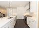 Spacious kitchen featuring a central island, stainless steel appliances, and a modern design at 709 Dodd Ln # 165, Buford, GA 30518