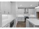 Kitchen with white subway tile backsplash, stainless steel appliances, and plenty of storage at 709 Dodd Ln # 165, Buford, GA 30518