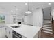 Modern kitchen features a center island with stainless appliances at 709 Dodd Ln # 165, Buford, GA 30518