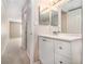 Bathroom boasts modern vanity with a sleek countertop and ample storage at 2220 Runnymead Se Rdg, Marietta, GA 30067