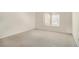 Inviting bedroom with neutral carpet and plenty of natural light at 2220 Runnymead Se Rdg, Marietta, GA 30067