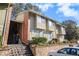 Charming two-story condo with a combination of siding and brickwork at 2220 Runnymead Se Rdg, Marietta, GA 30067