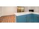 Kitchen area boasts stylish cabinets and a view of the cozy outdoor patio at 2220 Runnymead Se Rdg, Marietta, GA 30067