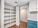 Spacious pantry features ample shelving for organization at 2220 Runnymead Se Rdg, Marietta, GA 30067
