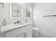 Contemporary bathroom with a stylish vanity with a LED mirror, and tiled floors at 5535 Buck Hollow Dr, Alpharetta, GA 30005