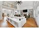 Elegant living room featuring a fireplace, and a view of the upper level balcony at 5535 Buck Hollow Dr, Alpharetta, GA 30005
