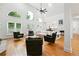 Bright living room with vaulted ceilings, fireplace and open concept design at 5535 Buck Hollow Dr, Alpharetta, GA 30005