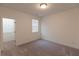 Comfortable bedroom with soft carpet and windows, creating a relaxing atmosphere at 706 Dodd Ln # 157, Buford, GA 30518