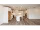 Bright kitchen with white cabinets, stainless steel appliances, and a large center island at 706 Dodd Ln # 157, Buford, GA 30518