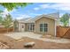 The backyard features a stone patio and landscaping at 728 Lorimore Pass, Canton, GA 30115