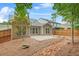 The backyard features a stone patio, rock garden and beautiful landscaping at 728 Lorimore Pass, Canton, GA 30115